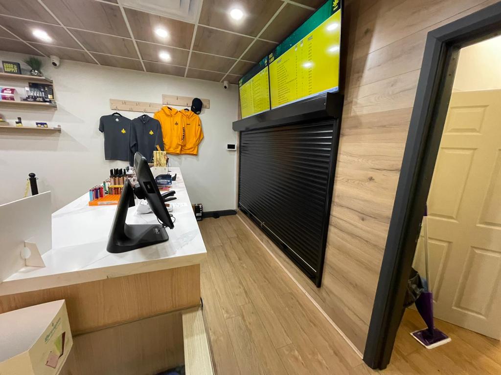 Roll-up counter shutter at a cannabis dispensary storage area