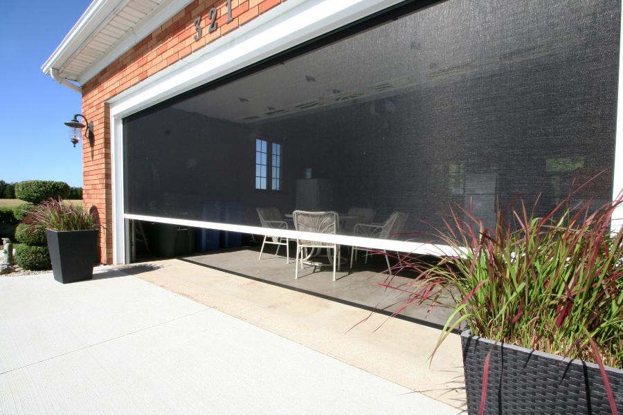 Screen on garage door opening