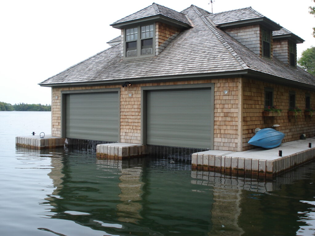 boat house with roller garage doors